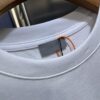 6931a050ccd8ab3d7af94138 Dior Charm Logo Patch Short-Sleeve T-Shirt