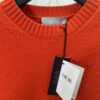 6931a058ccd8ab3d7af941df DIOR 25SS New Arrival Knitwear from the DIOR AND KAWS Limited Collection. Crafted from red and burgundy wool knit fabric, one sleeve features the DIOR AND KAWS signature embroidery, reinterpreting the Dior logo with a vibrant serpentine motif. The hem and cuffs feature contrasting details, perfect for pairing with classic jeans or shorts to create a striking look.