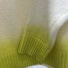 6931a059ccd8ab3d7af941eb Dior 25SS New Arrival Knitwear from the DIOR AND KAWS Limited Edition Collection. Crafted from white and yellow wool knit fabric, one sleeve features the DIOR AND KAWS signature embroidery, reinterpreting the Dior logo with a colorful serpentine design. The hem and cuffs are finished with contrasting details, perfect for pairing with classic jeans or shorts to create a striking look.