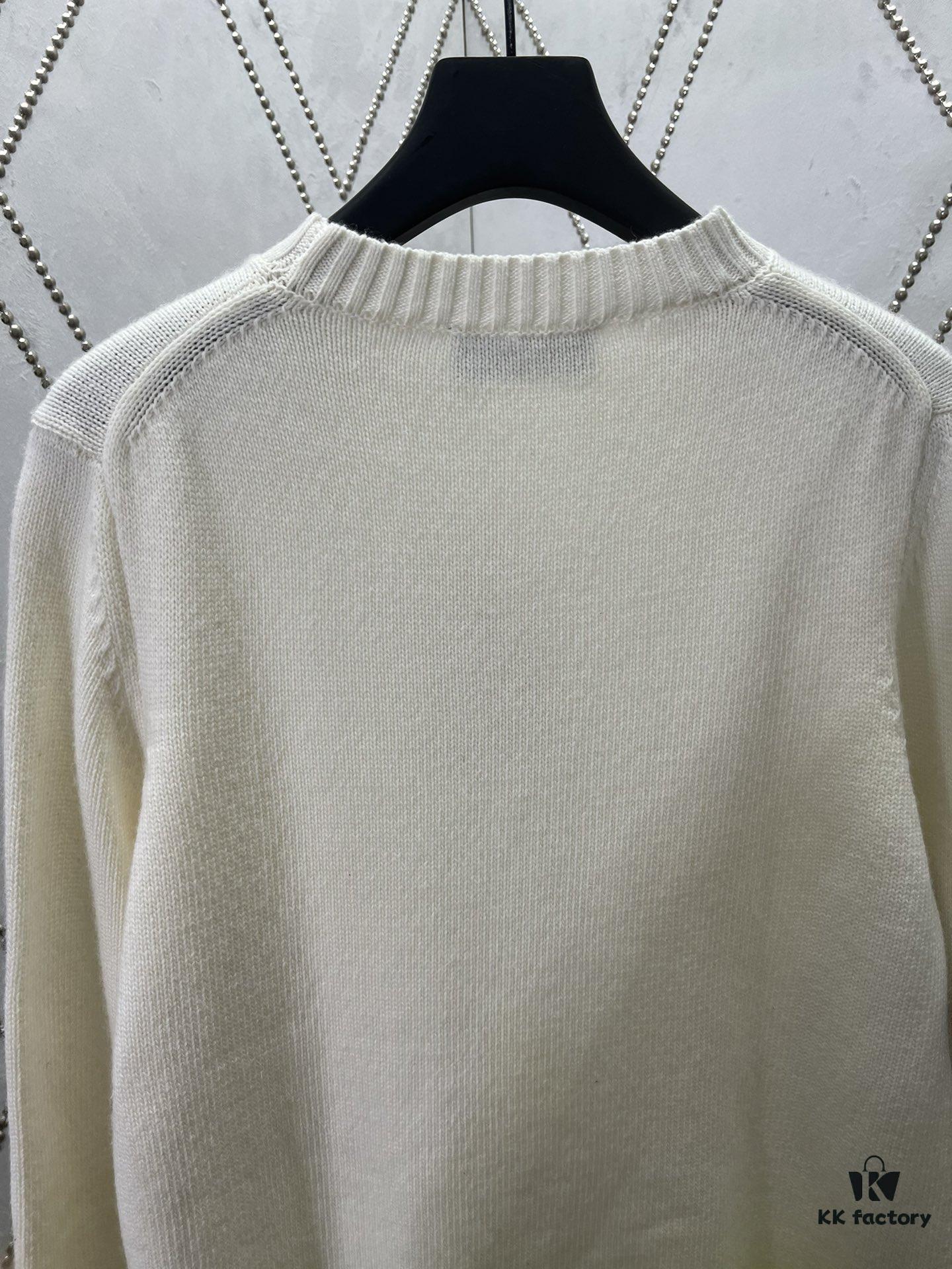 6931a059ccd8ab3d7af941ec Dior 25SS New Arrival Knitwear from the DIOR AND KAWS Limited Edition Collection. Crafted from white and yellow wool knit fabric, one sleeve features the DIOR AND KAWS signature embroidery, reinterpreting the Dior logo with a colorful serpentine design. The hem and cuffs are finished with contrasting details, perfect for pairing with classic jeans or shorts to create a striking look.