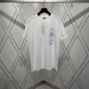 6931a05accd8ab3d7af941fa Dior 25SS New Arrival T-Shirt Featuring Signature Motifs from the Dior and Hylton Nel Collaboration Collection This Season. Crafted from Premium White Cotton Jersey, This Classic Silhouette Boasts a Ribbed Round Neckline, with Striking Contrast Prints on Both Front and Back for Elevated Style. Designed with a Relaxed Fit, Perfectly Paired with Sweatpants or Jeans.