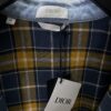 6931a060ccd8ab3d7af94273 Dior 25SS Spring Collection New Arrival Denim Shirt with Single-Breasted Button Closure and Chest Embroidered Logo Unisex Style