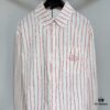 6931a08fccd8ab3d7af94602 Dior 25ss New Arrival Shirt Combines Modern Elegance with Traditional Aesthetics. Crafted from White Cotton Poplin, Featuring Pink Stripe Pattern and the 'Dior For My Real Friends' Logo from the DIOR AND HYLTON NEL Collaboration Series. Includes a Patch Pocket on the Chest and Hidden Button Closure for a Refined Look. Ideal for Everyday Wear.