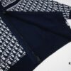 6931a0a0ccd8ab3d7af94765 DIOR Knit Coat with Reversible Cashmere and Logo Pattern