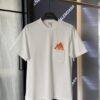 6931a0d6ccd8ab3d7af94bb2 LOEWE x Spirited Away Collaboration Flame Embroidered Doll Washed Cotton T-Shirt