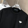 6931a0e9ccd8ab3d7af94c6f PRADA 2025 Spring/Summer New Arrival Round Neck Short Sleeve T-Shirt with Triangular Logo Patch on Chest and Side Seam Pocket, Made of 320g Double-Yarn Combed Cotton Fabric, Slightly Loose Fit, Soft and Substantial Fabric Texture, Unisex Design