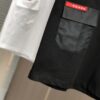 6931a0e9ccd8ab3d7af94c71 PRADA 2025 Spring/Summer New Arrival Round Neck Short Sleeve T-Shirt with Triangular Logo Patch on Chest and Side Seam Pocket, Made of 320g Double-Yarn Combed Cotton Fabric, Slightly Loose Fit, Soft and Substantial Fabric Texture, Unisex Design