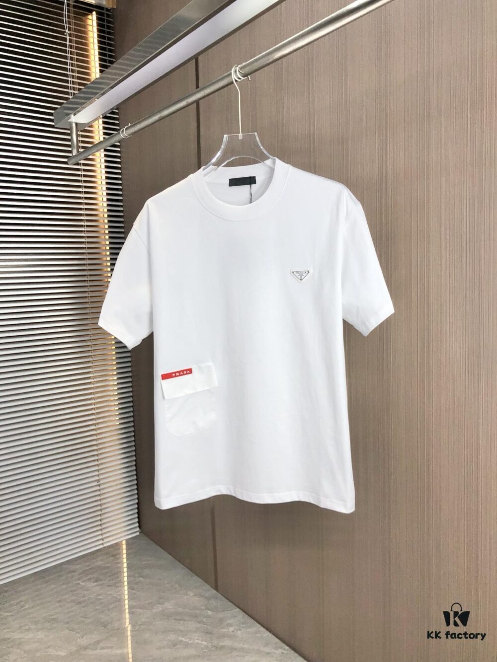 6931a0e9ccd8ab3d7af94c77 PRADA 2025 Spring/Summer New Arrival Round Neck Short Sleeve T-Shirt with Triangular Logo Patch on Chest and Side Stitch Pocket, Made of High Grammage 320g Double-Yarn Combed Cotton Fabric, Slightly Loose Fit, Soft and Substantial Fabric Texture, Unisex Design