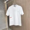 6931a0e9ccd8ab3d7af94c77 PRADA 2025 Spring/Summer New Arrival Round Neck Short Sleeve T-Shirt with Triangular Logo Patch on Chest and Side Stitch Pocket, Made of High Grammage 320g Double-Yarn Combed Cotton Fabric, Slightly Loose Fit, Soft and Substantial Fabric Texture, Unisex Design