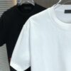 6931a0e9ccd8ab3d7af94c79 PRADA 2025 Spring/Summer New Arrival Round Neck Short Sleeve T-Shirt with Triangular Logo Patch on Chest and Side Stitch Pocket, Made of High Grammage 320g Double-Yarn Combed Cotton Fabric, Slightly Loose Fit, Soft and Substantial Fabric Texture, Unisex Design