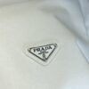 6931a0eaccd8ab3d7af94c7d PRADA 2025 Spring/Summer New Arrival Round Neck Short Sleeve T-Shirt with Triangular Logo Patch on Chest and Side Stitch Pocket, Made of High Grammage 320g Double-Yarn Combed Cotton Fabric, Slightly Loose Fit, Soft and Substantial Fabric Texture, Unisex Design
