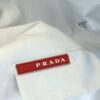 6931a0eaccd8ab3d7af94c7e PRADA 2025 Spring/Summer New Arrival Round Neck Short Sleeve T-Shirt with Triangular Logo Patch on Chest and Side Stitch Pocket, Made of High Grammage 320g Double-Yarn Combed Cotton Fabric, Slightly Loose Fit, Soft and Substantial Fabric Texture, Unisex Design