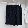 6931a0f5ccd8ab3d7af94d60 PRADA Waffle-Knit Zipper Shorts