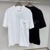 6931a0f9ccd8ab3d7af94db1 Prada Prada Short Sleeve with Front Zipper Pocket