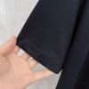 6931a0f9ccd8ab3d7af94db7 Prada Prada Short Sleeve with Front Zipper Pocket