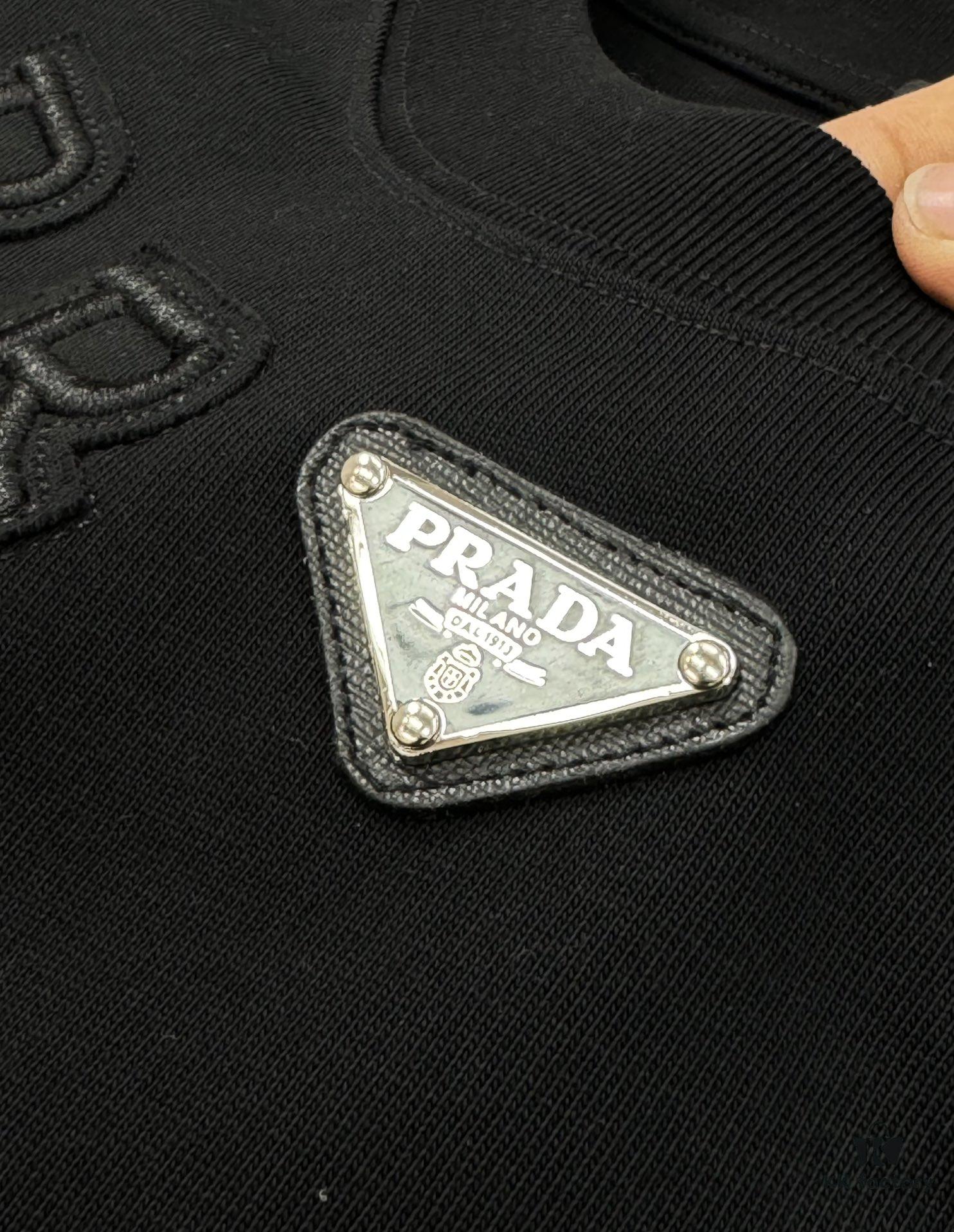 6931a106ccd8ab3d7af94ea2 PRADA New Arrival Unisex T-Shirt 25S – Official Website Launch, 3D Embroidered Logo Design with Classic Leather Triangle Badge, Premium 40-Single 260g Cotton Fabric, Breathable and Comfortable, Essential Wardrobe Piece for Layering or Wearing Alone