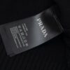 6931a10bccd8ab3d7af94ef8 Prada Jacquard Letter Knit Sweater Coat Y077