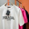 6931a112ccd8ab3d7af94f8e PRADA 2025 Spring/Summer New Arrival Short Sleeve T-Shirt! Runway-Inspired Fashion Casual Tee with Signature Logo Design! Premium 260g 100% Cotton Fabric, Soft and Skin-Friendly Texture, Exceptional Comfort and Breathability – Truly Irresistible in Person! Gender-Neutral Unisex Style for Couples, Redefining Contemporary Fashion Elegance! Distinguished from Standard Market Versions ️ High-End Collection!
