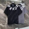 6931a11eccd8ab3d7af95077 25ss PRADA Hand-Painted Logo T-Shirt Inspired by 80s Retro Style