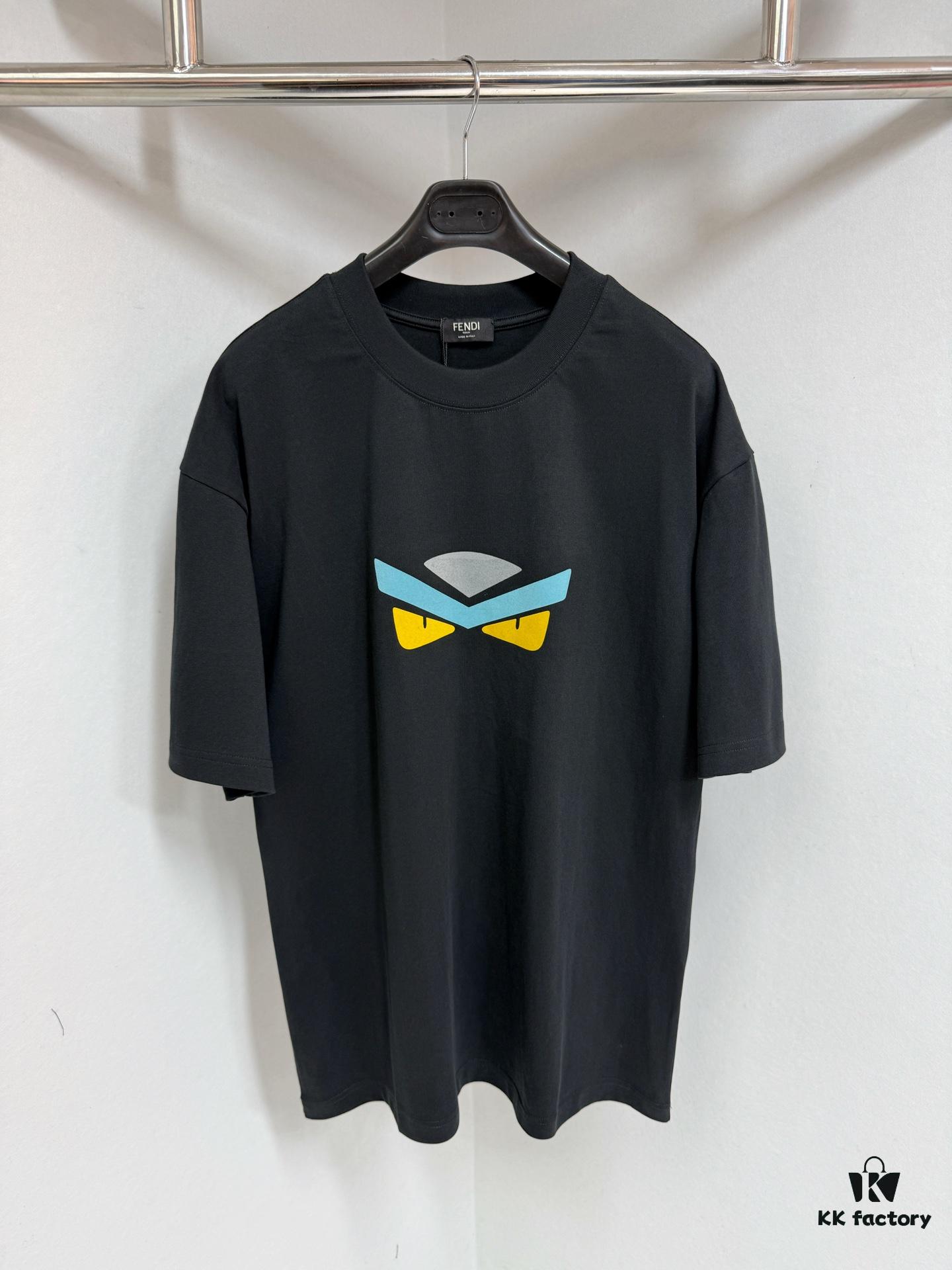 6931a145ccd8ab3d7af95361 FENDI Round-Neck Short-Sleeve T-Shirt with Eye Print, Pure Cotton Fabric Featuring Gold Snake-Eye Design and Lettering Logo, Mother-of-Pearl Buttons