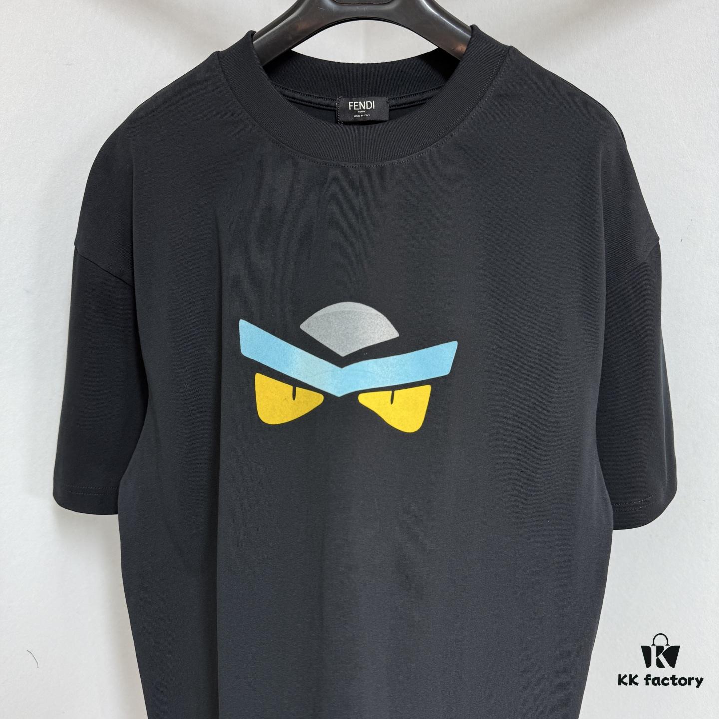 6931a146ccd8ab3d7af95363 FENDI Round-Neck Short-Sleeve T-Shirt with Eye Print, Pure Cotton Fabric Featuring Gold Snake-Eye Design and Lettering Logo, Mother-of-Pearl Buttons