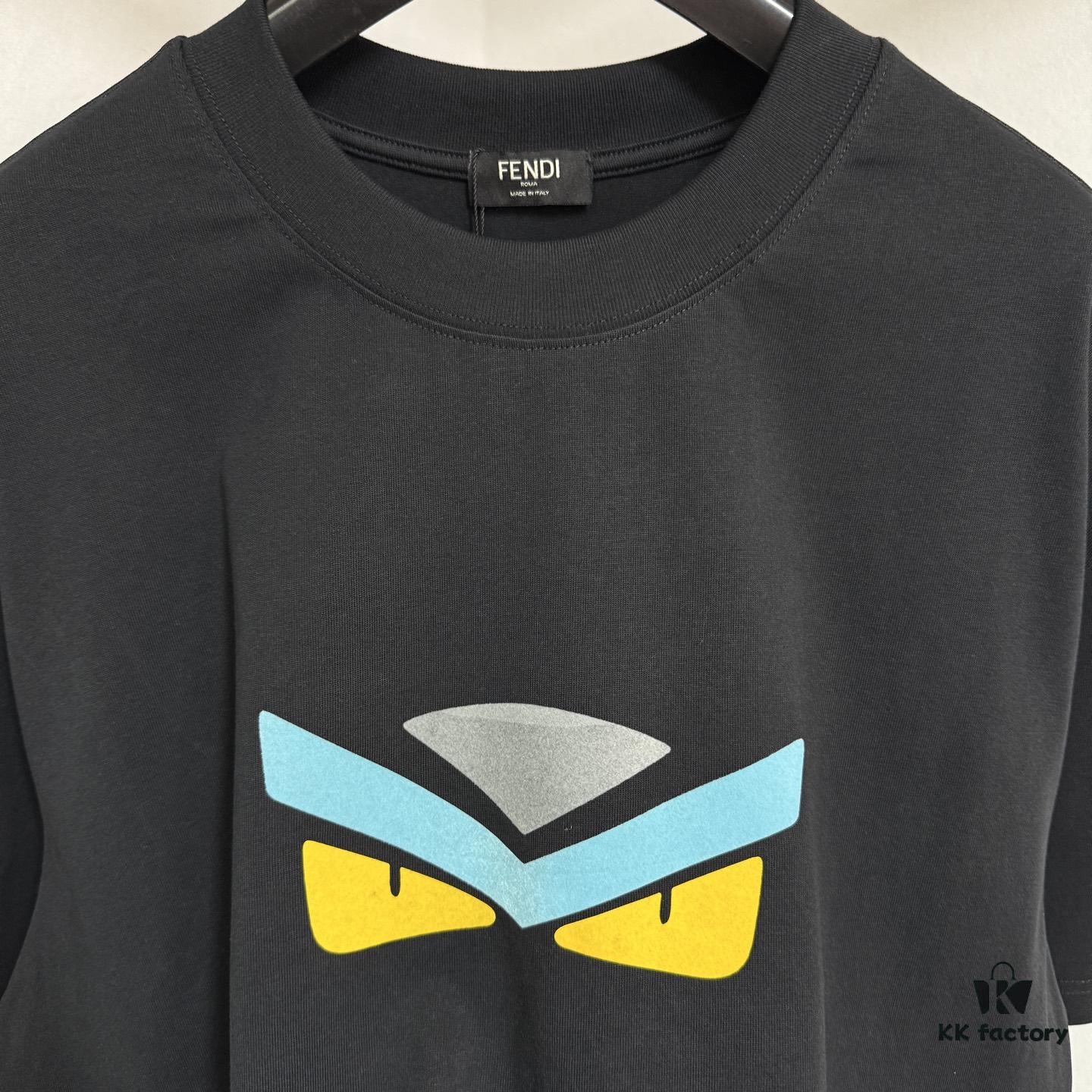 6931a146ccd8ab3d7af95364 FENDI Round-Neck Short-Sleeve T-Shirt with Eye Print, Pure Cotton Fabric Featuring Gold Snake-Eye Design and Lettering Logo, Mother-of-Pearl Buttons