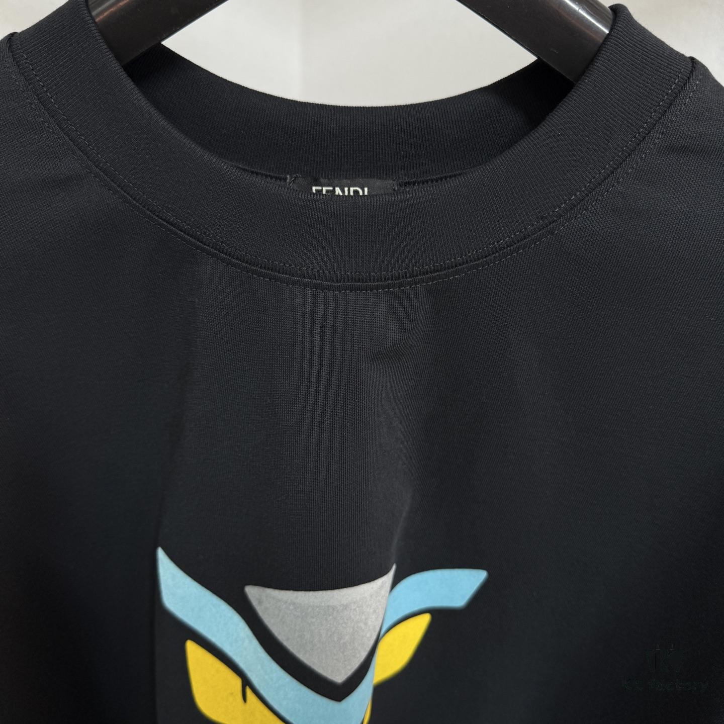 6931a146ccd8ab3d7af95367 FENDI Round-Neck Short-Sleeve T-Shirt with Eye Print, Pure Cotton Fabric Featuring Gold Snake-Eye Design and Lettering Logo, Mother-of-Pearl Buttons
