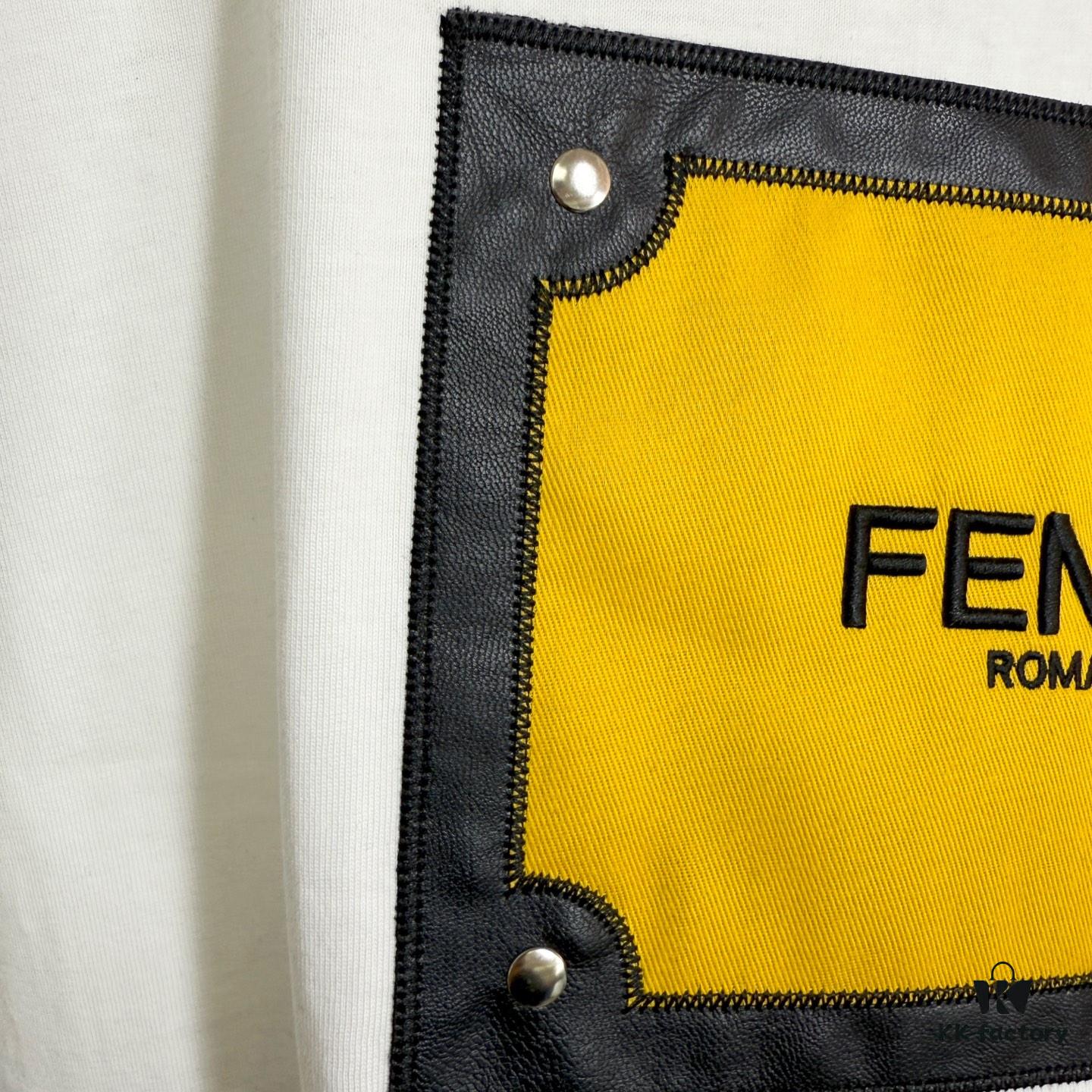 6931a146ccd8ab3d7af9536e FENDI Panelled Leather Letter Appliqué Round-Neck Short-Sleeve T-Shirt