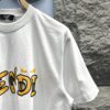 6931a14dccd8ab3d7af953f4 FENDI Rainbow Print Logo Short Sleeve T-Shirt