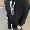 6931a19accd8ab3d7af95a0c CELINE Letter Tape Drawstring Hoodie