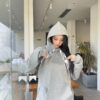 6931a19bccd8ab3d7af95a0f CELINE Letter Tape Drawstring Hoodie