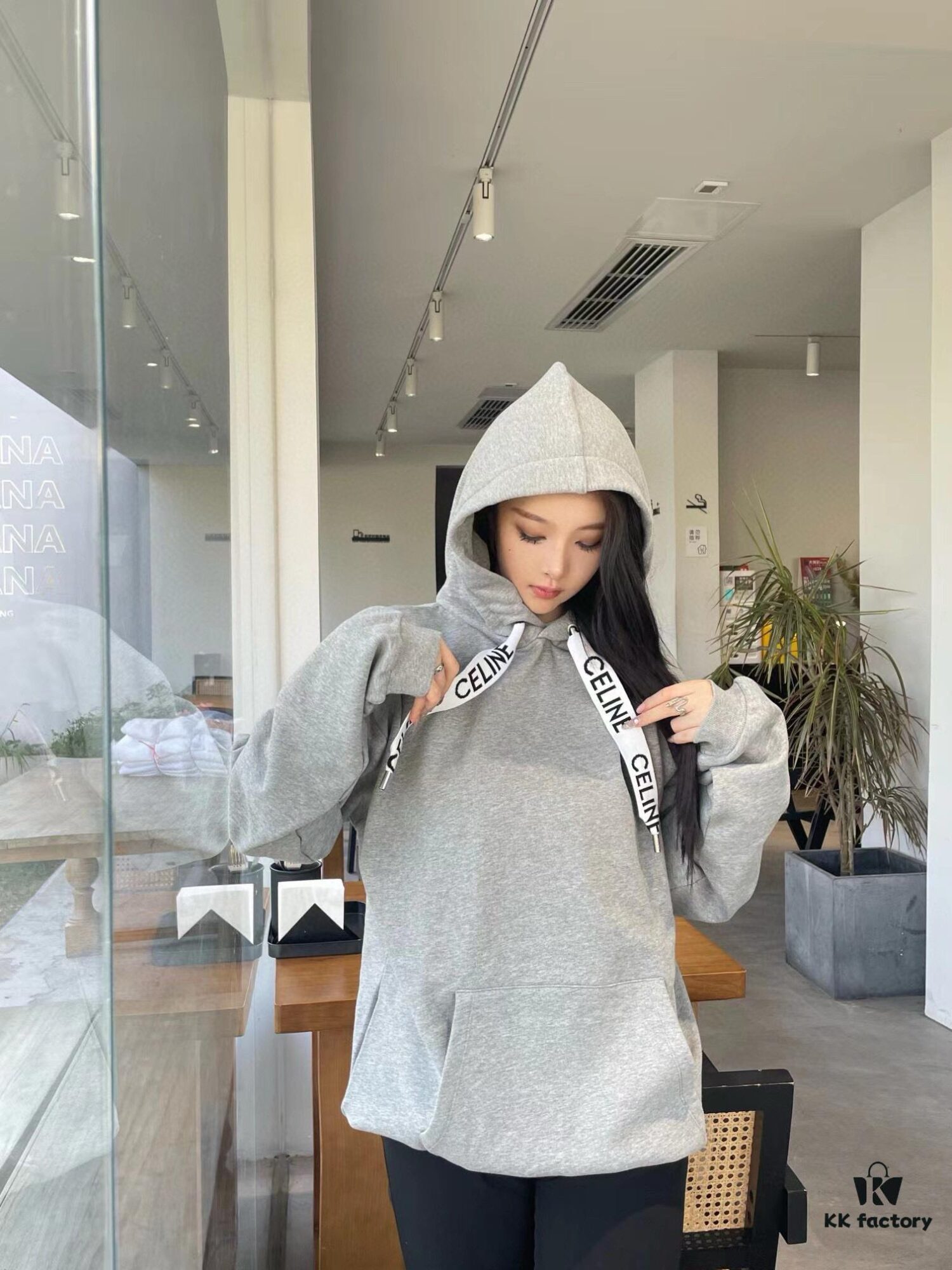 6931a19bccd8ab3d7af95a0f CELINE Letter Tape Drawstring Hoodie
