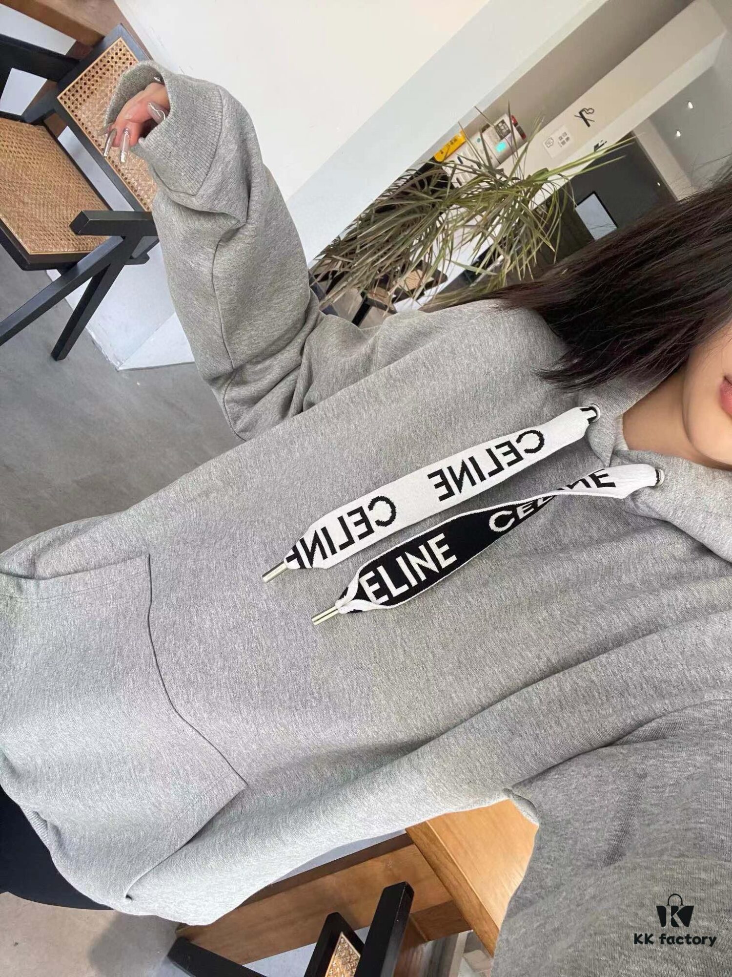 6931a19bccd8ab3d7af95a13 CELINE Letter Tape Drawstring Hoodie