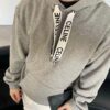 6931a19bccd8ab3d7af95a15 CELINE Letter Tape Drawstring Hoodie
