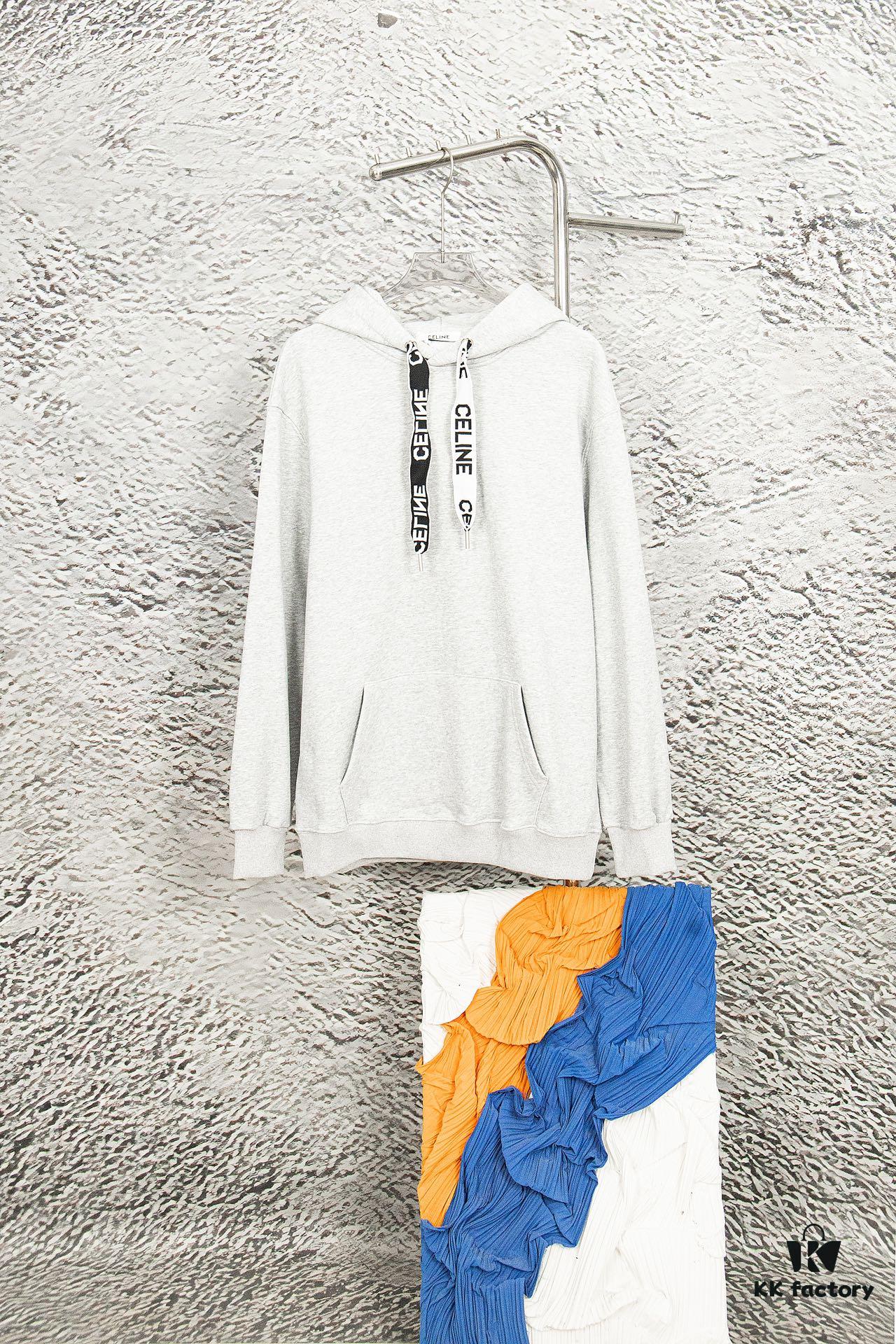 6931a19cccd8ab3d7af95a24 CELINE Letter Tape Drawstring Hoodie