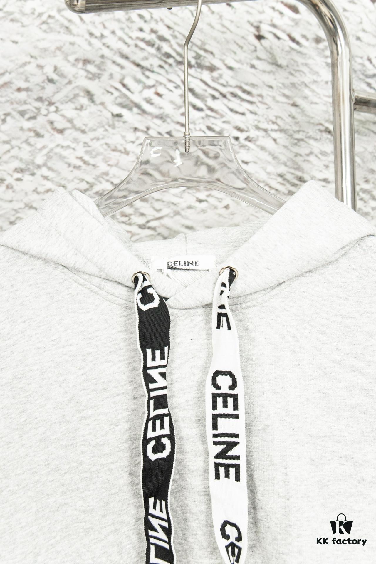 6931a19cccd8ab3d7af95a27 CELINE Letter Tape Drawstring Hoodie