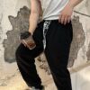 6931a19cccd8ab3d7af95a2f CELINE Klein Blue Letter Logo Sporty Casual Pants