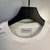 6931a1e8ccd8ab3d7af95faa High-End Maison Margiela x Tommy Cash Embroidered Logo Short Sleeve T-Shirt