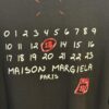 6931a1efccd8ab3d7af96020 High-End Maison Margiela MM6 2024 Slurry Print Calendar 13 Short Sleeve T-Shirt
