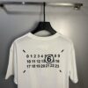 6931a1f2ccd8ab3d7af96056 High-End Maison Margiela 2024 Four-Corner Numeric Print Short-Sleeve T-Shirt