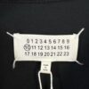 6931a1f3ccd8ab3d7af9606f High-End Maison Margiela 2024 Irregular Patchwork Letter Short-Sleeve T-Shirt
