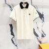 6931a221ccd8ab3d7af9636e MONCLER Turn-down Collar Polo Shirt with Contrast Trim and Branded Logo Patch