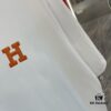 6931a28eccd8ab3d7af96a44 Hermes 2025 Spring-Summer New Short Sleeve T-Shirt with Hand-Customized Logo on Chest, Pure Cotton Fabric with Gold Thread Embroidery, Classic Buttoned Hem and OS Drop-Shoulder Fit