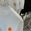 6931a290ccd8ab3d7af96a6a Hermes 2025 Spring Collection Short Sleeve Shirt, Hand-Customized Logo at Chest, Pure Cotton Fabric with Gold Thread Embroidery, Classic Buttoned Hem, OS Drop-Shoulder Fit