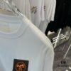 6931a291ccd8ab3d7af96a76 Hermes 2025 Spring Collection Short Sleeve T-Shirt with Handcrafted Logo at Chest