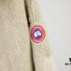 6931a318ccd8ab3d7af97462 Canada Goose Simcoe Fleece Zip-Up Jacket in Apricot and Black