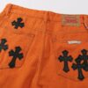 6931a3c9ccd8ab3d7af98067 Chrome Hearts & Croc Heart Art Basel Orange Flared Jeans with Cross Design