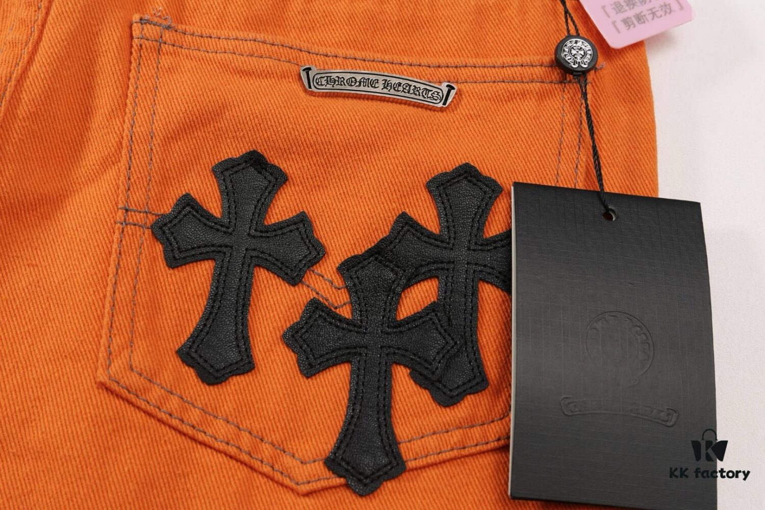 6931a3c9ccd8ab3d7af98068 Chrome Hearts & Croc Heart Art Basel Orange Flared Jeans with Cross Design