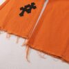 6931a3c9ccd8ab3d7af98069 Chrome Hearts & Croc Heart Art Basel Orange Flared Jeans with Cross Design