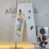 6931a3e6ccd8ab3d7af9827b Chrome Hearts & CH Mattyboy Graffiti Painted Leopard Print Jeans